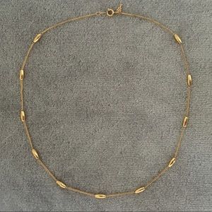 Gold necklace simple barrel accents